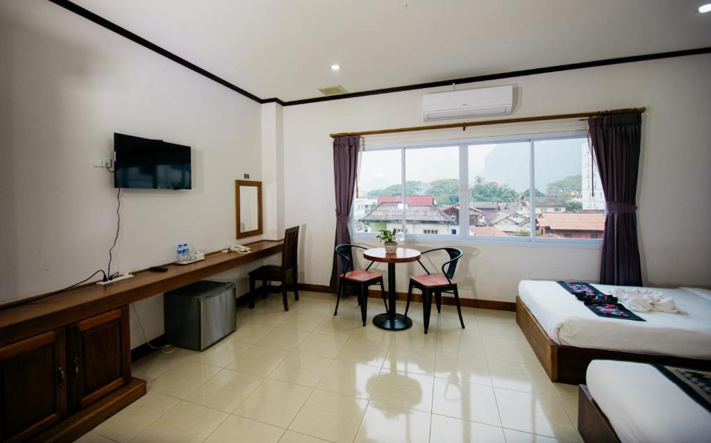 media/images/country-pages/laos/the-northeast/comfort-best-of-vang-vieng/sisombath-plaza-hotel-room2/3977786-1-eng-GB/sisombath-plaza-hotel-room2.jpg