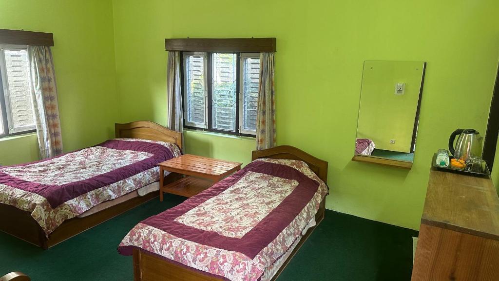 media/images/country-pages/nepal/kathmandu-and-nearby/standalone-accommodation/one-night-at-new-pokhara-lodge/new-pokhara-lodge-2/4194207-1-eng-GB/new-pokhara-lodge-2.jpg